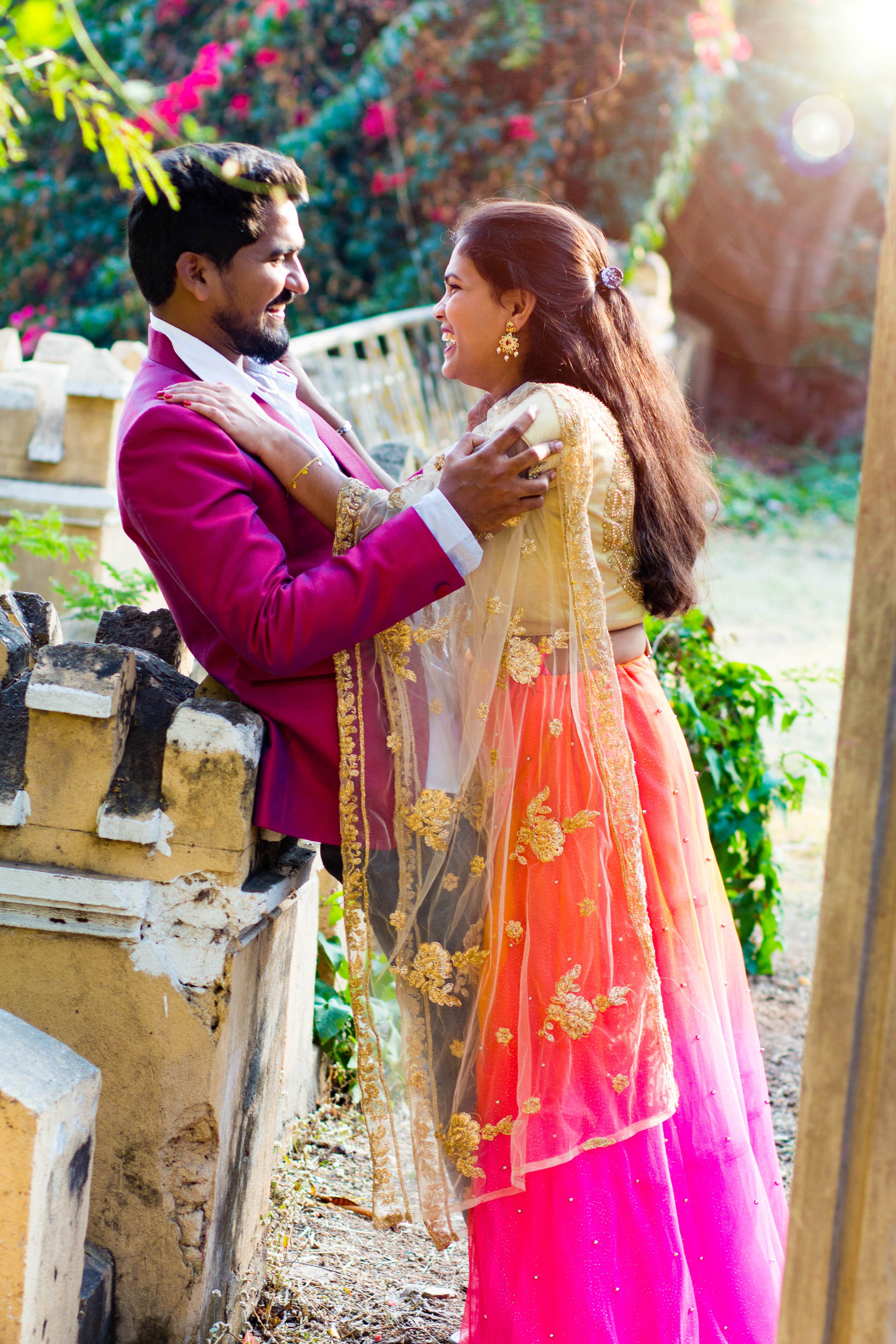Couple in vibrant festive Indian attire